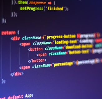 Computer code displayed on a monitor, featuring syntax highlighting. The code appears to be written in JavaScript, with HTML elements indicating a part of a web application. Various tags, class names, and functions are visible, emphasizing a focus on front-end development.