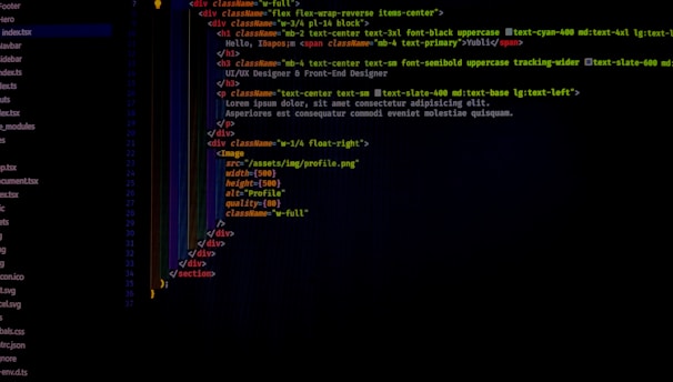 A computer screen displays software code in a text editor. The code seems to be related to a web page with HTML and CSS components. On the left side, a file tree shows various file names in a project. The code includes HTML structure and styling classes.